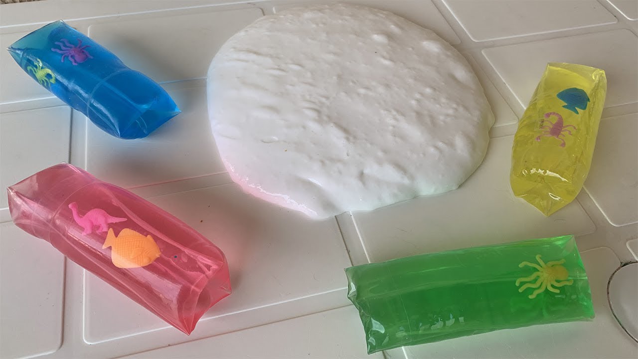 COLORINDO SLIME DE COLA BRANCA COM COBRA D'ÁGUA COLORIDA!!!