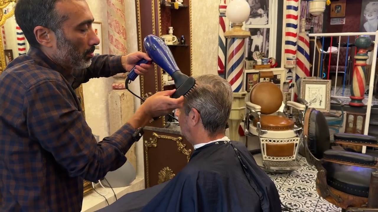 Soothing scissor cut by Arthur Rubinoff at NYC Barber Shop Museum