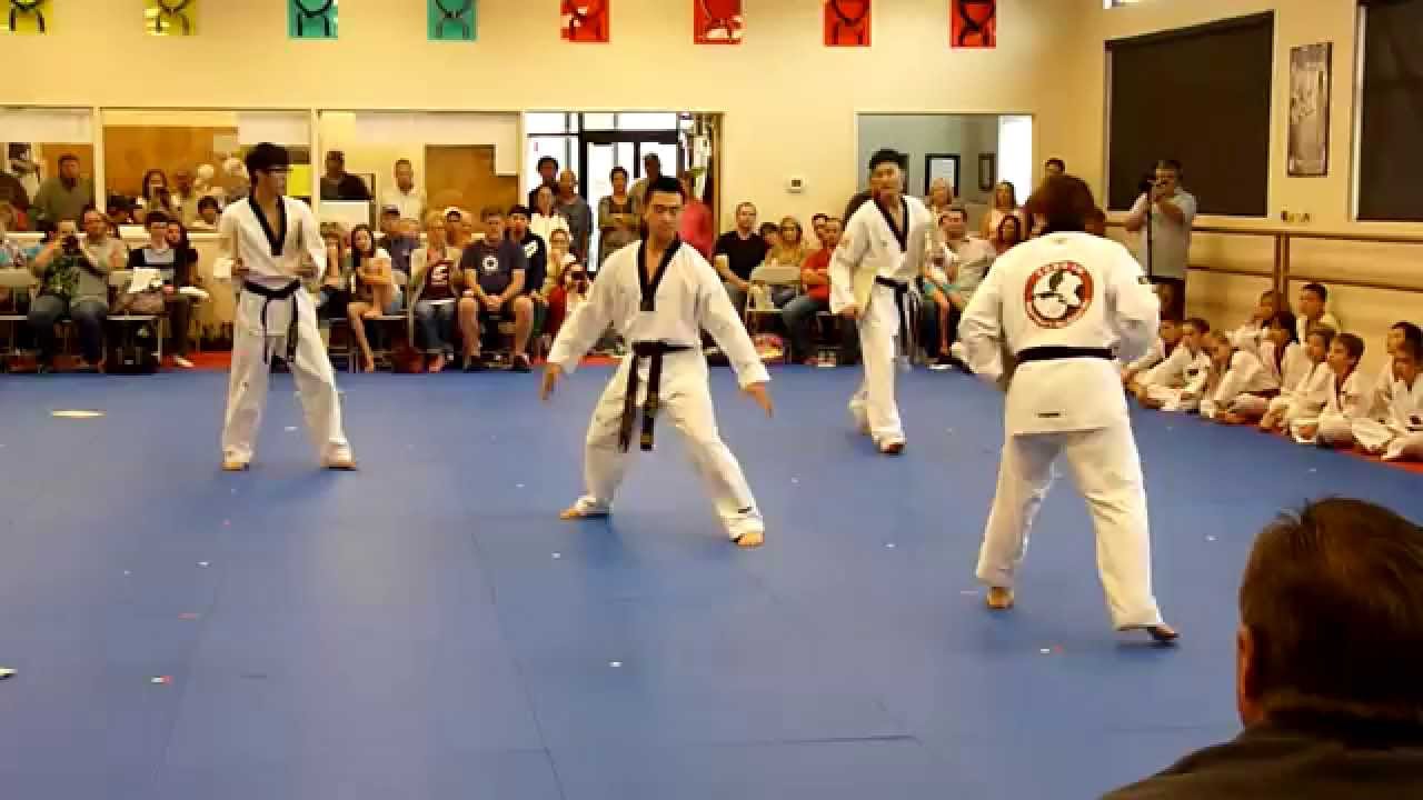 Master Kim's 4th degree Black Belt Test - Board Breaking - Master Lee's yong In Taekwondo