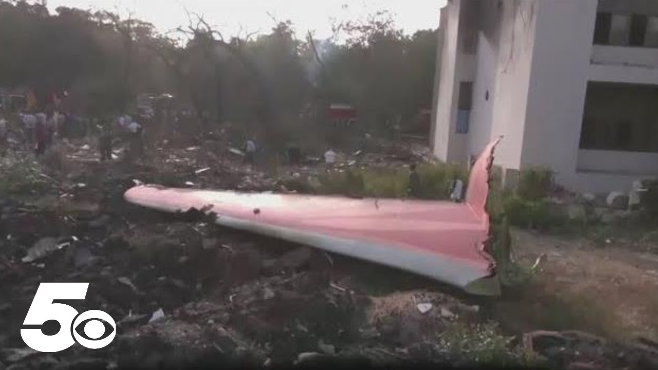 At least 240 dead after plane crashes into populated area in India