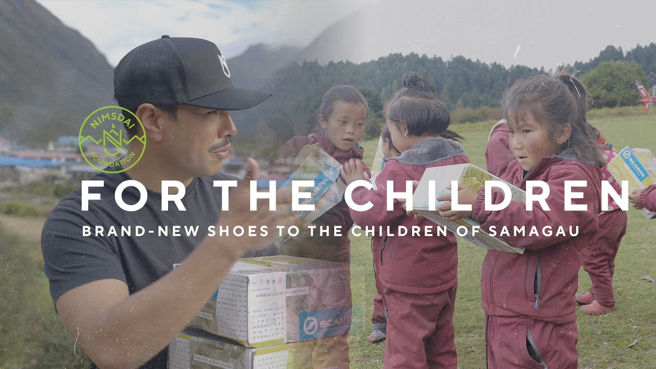 Delivering brand-new shoes to the children of Samagau - The Nimsdai Foundation.