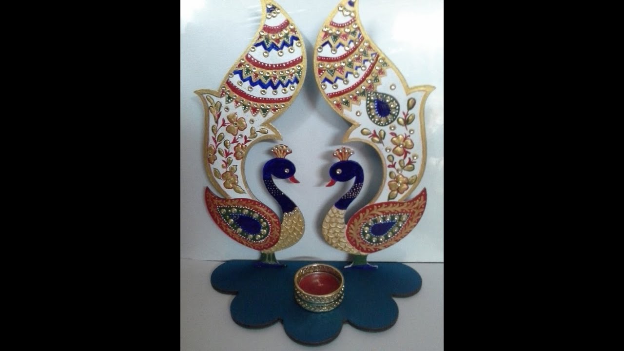Meenakari design painting on a Diya stand