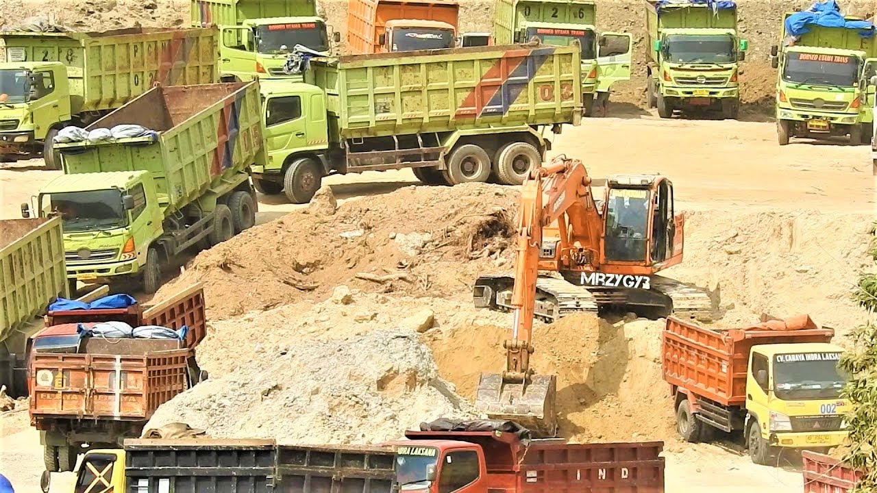Excavator Dump Truck Digging Loading Dirt On Quarry For Airport Construction Bandara NYIA