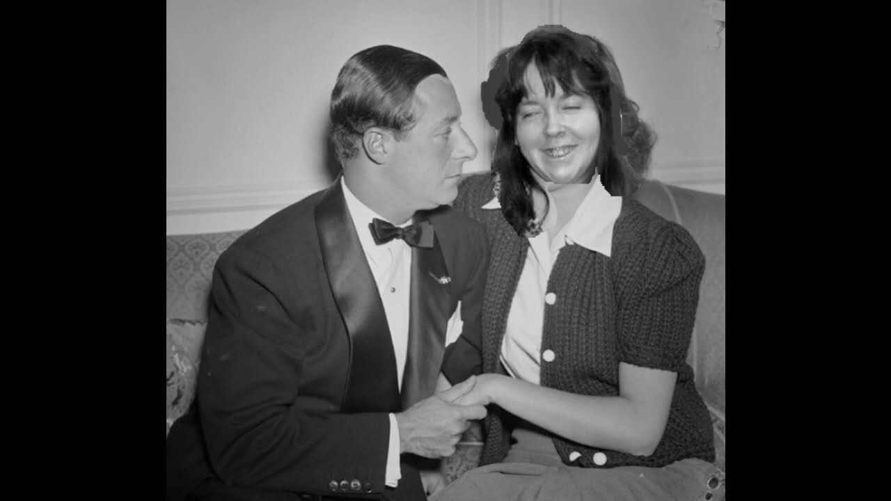 George Jessel serenades Wendy the slow adult.