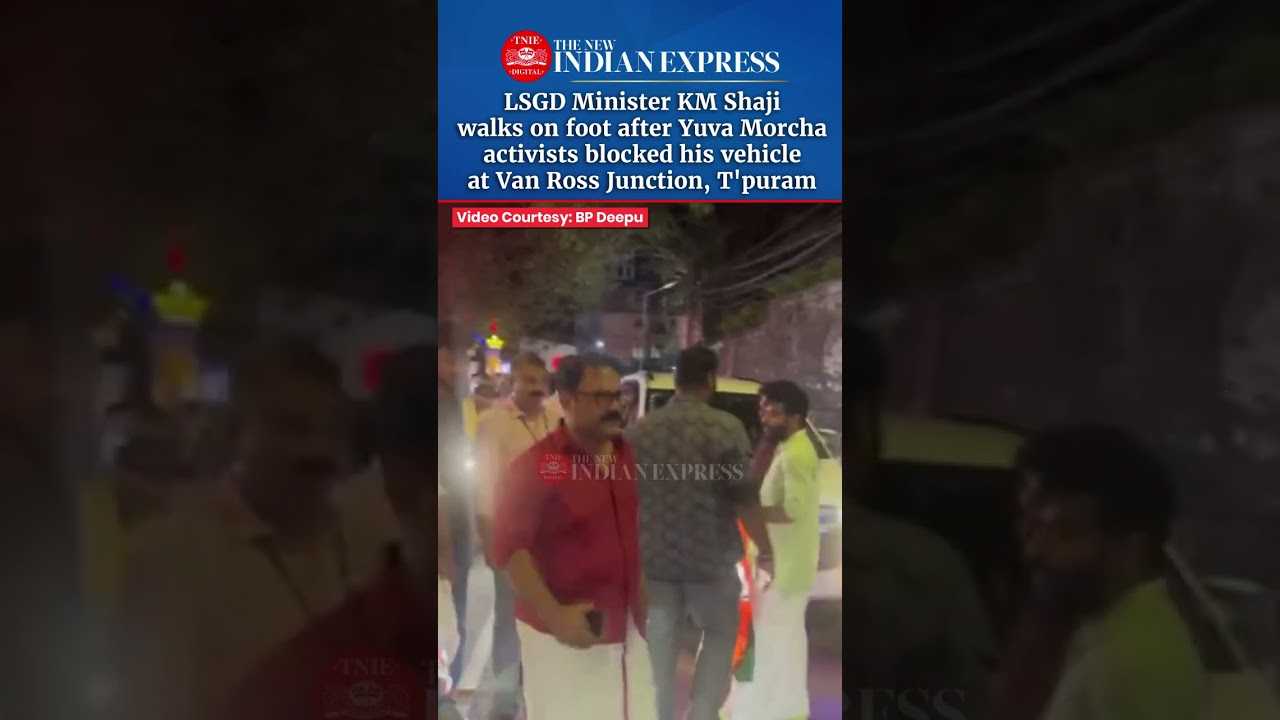 LSGD Minister KM Shaji walks on foot after Yuva Morcha activists blocked his vehicle in T'puram