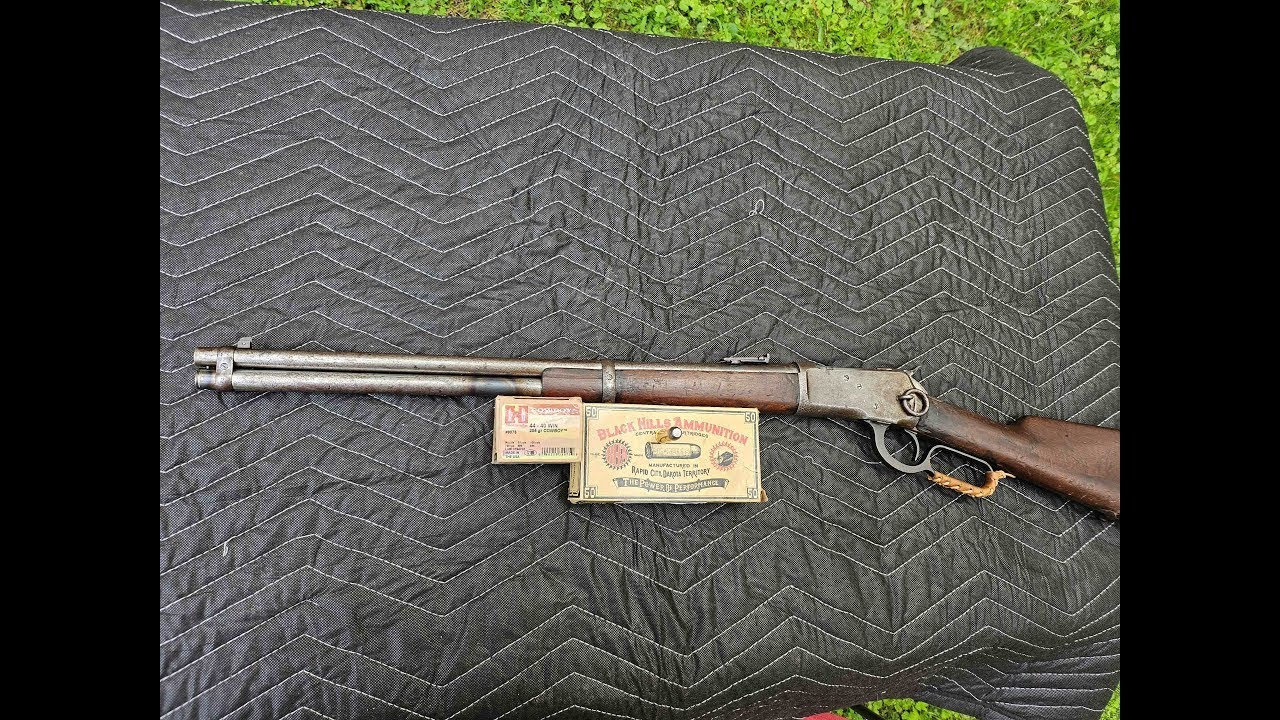 A 120 year old Winchester 1892 lever action rifle, and the  44 WCF aka 44 40 cartridge 152 yr old