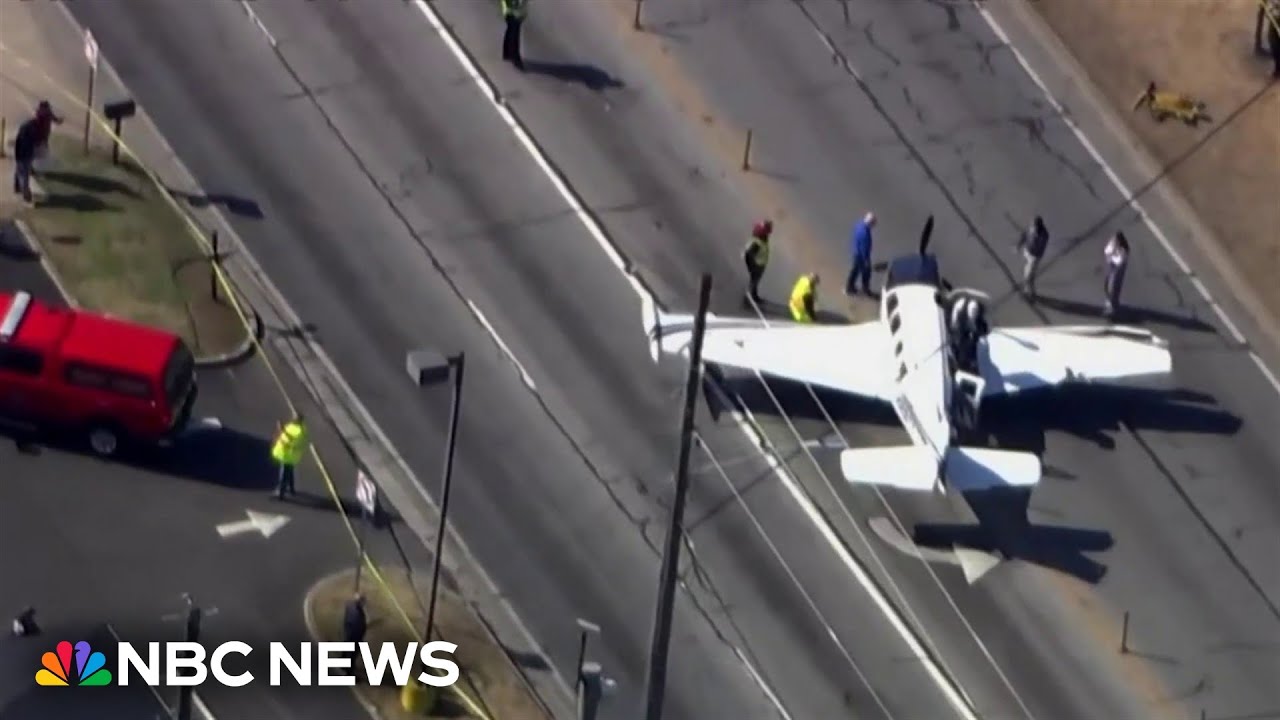 Small plane crash lands on busy Georgia street