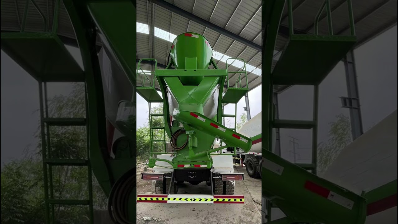 Buy a Shaanxi Automobile Concrete Mixing Truck 4-6 with White Green Stripes