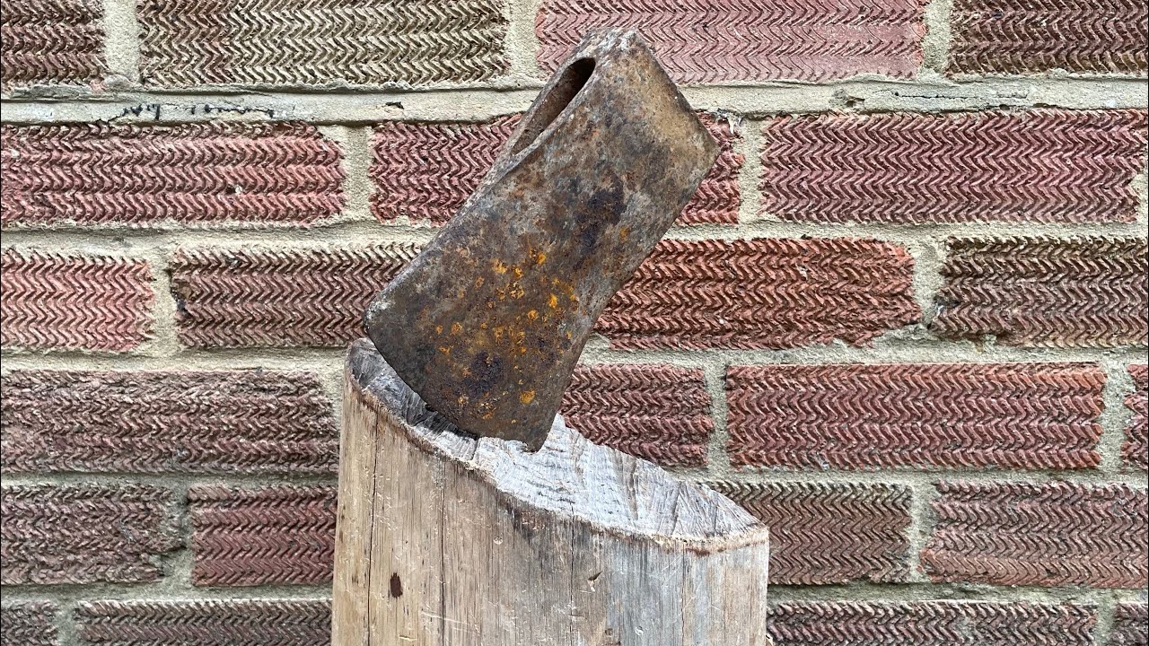 84 year old rusty axe head restoration
