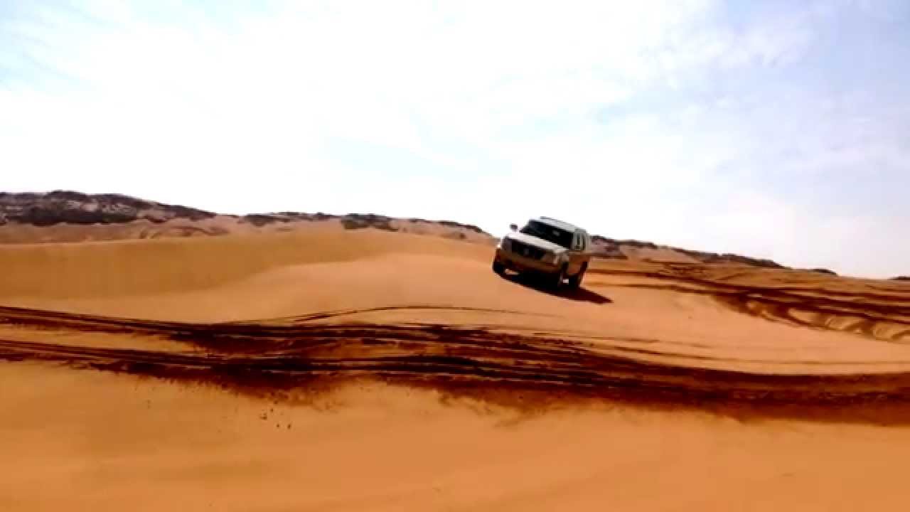 Cadillac Escalade off road in Dubai sand