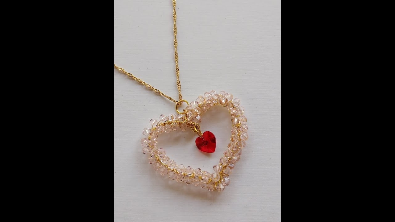 Corazón en armazón y cristales.Juana Marina.