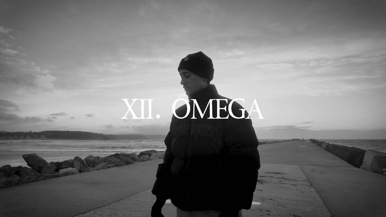 XII. OMEGA [ΑΩ] ACKLO
