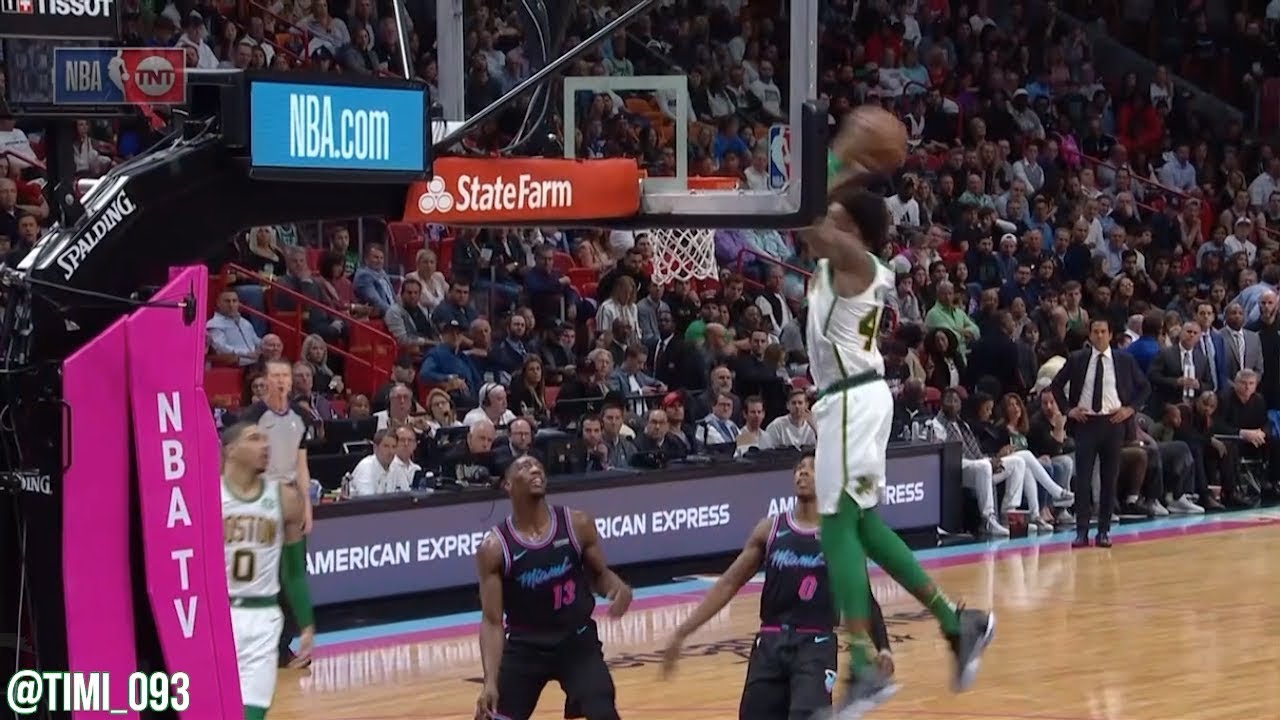 Robert Williams almost hits his head on the rim as he dunks it hard!