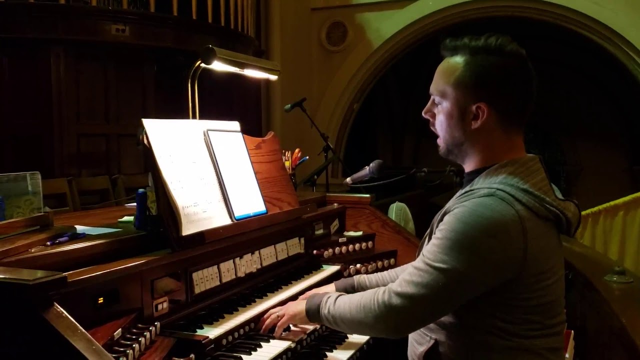 Nick Myers plays the organ and sings at St  Nicholas of Tolentine Church on Wednesday, Sept 18, 2019