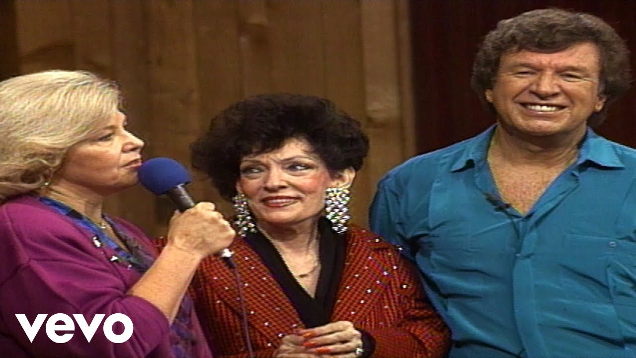 Bill & Gloria Gaither - There's Something About That Name (Live)
