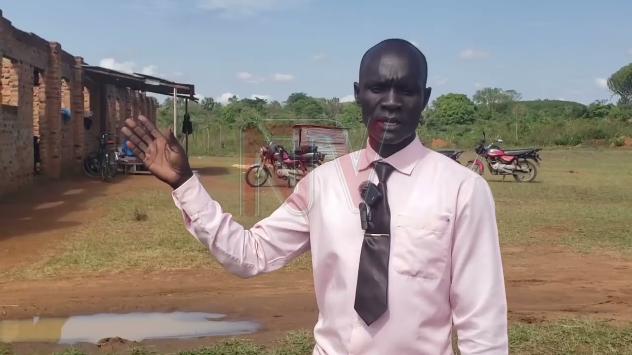 Lira children attend class in a roofless classroom block