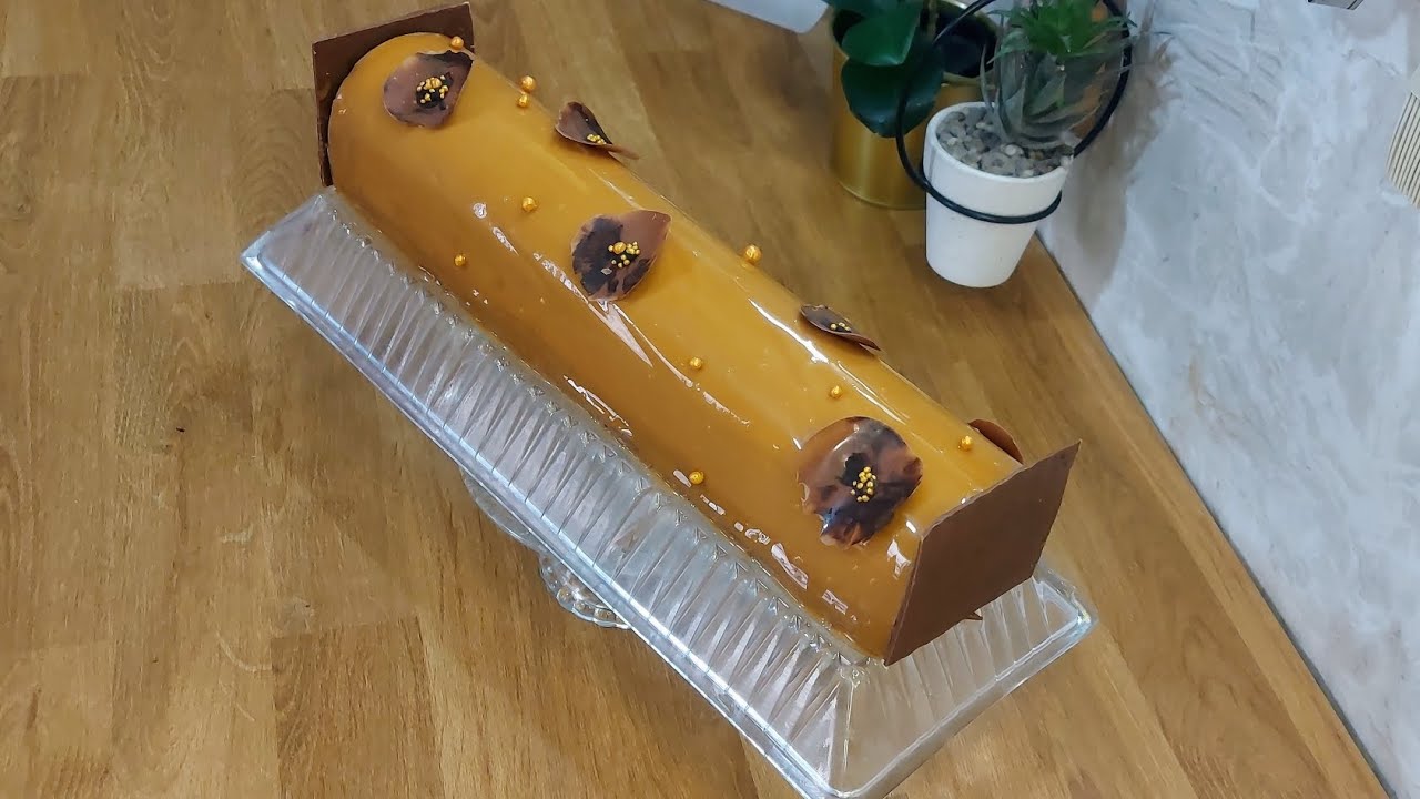 Bûche au chocolat et caramel حلوى للاحتفال بالكراميل والشكلاط غنية بالنكهات. 