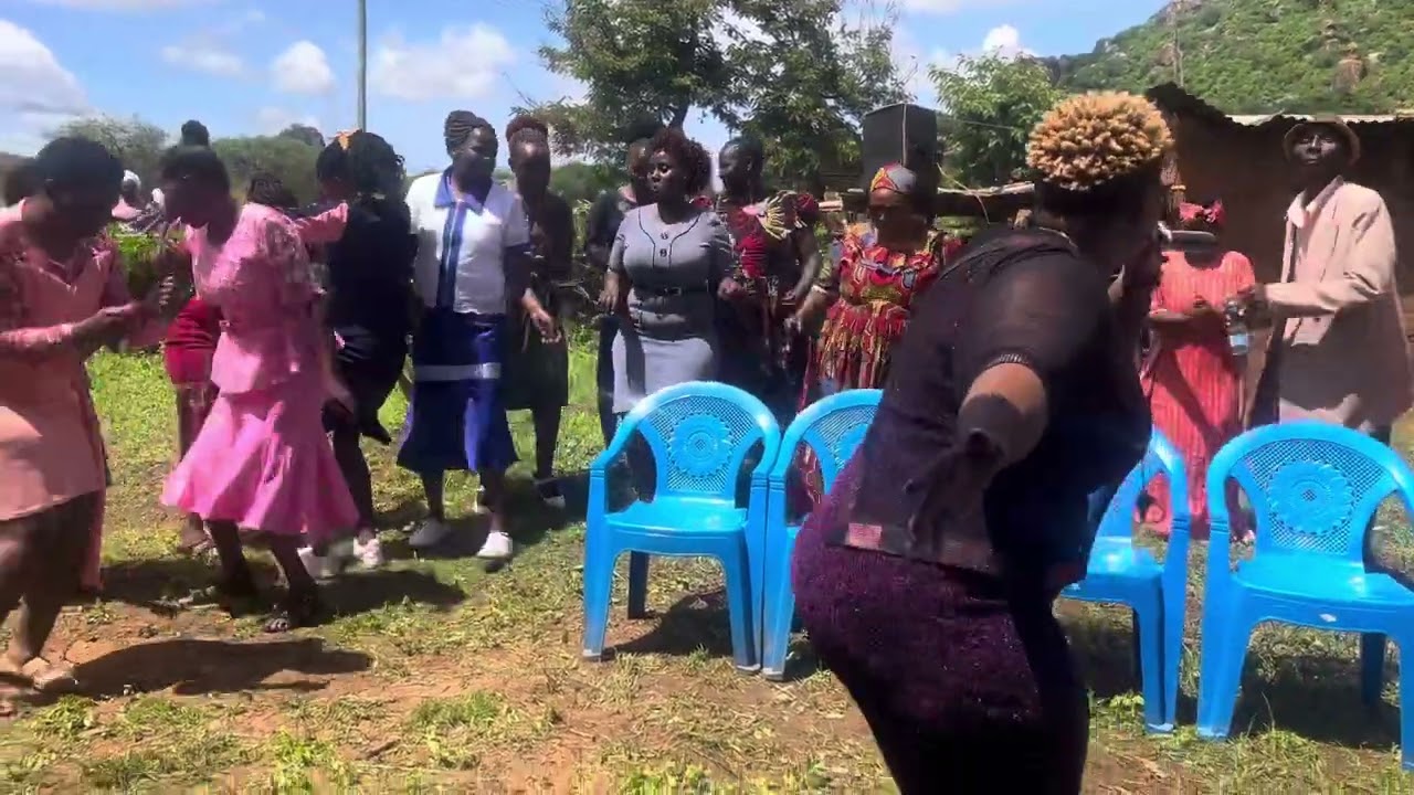 Kamba ladies dancing during a parental visit event in Ukambani