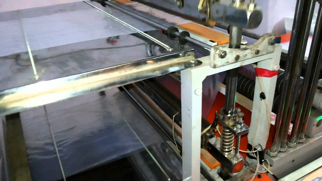 Double decker bottom sealing cutting machine