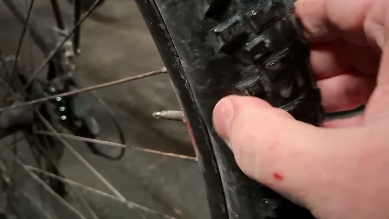 Let the air out of the tire of a girl's bike on a public parking.