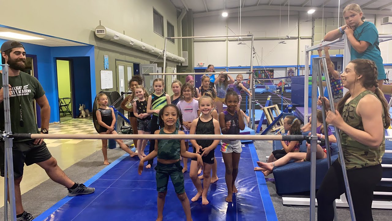 Gymnasts Playing Limbo