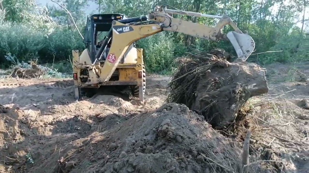 CAT 434E Büyük kökü koparıyor