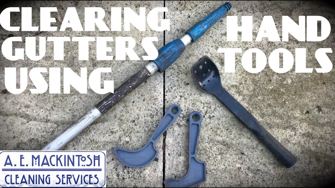 Clearing Out Gutters Using Hand Tools