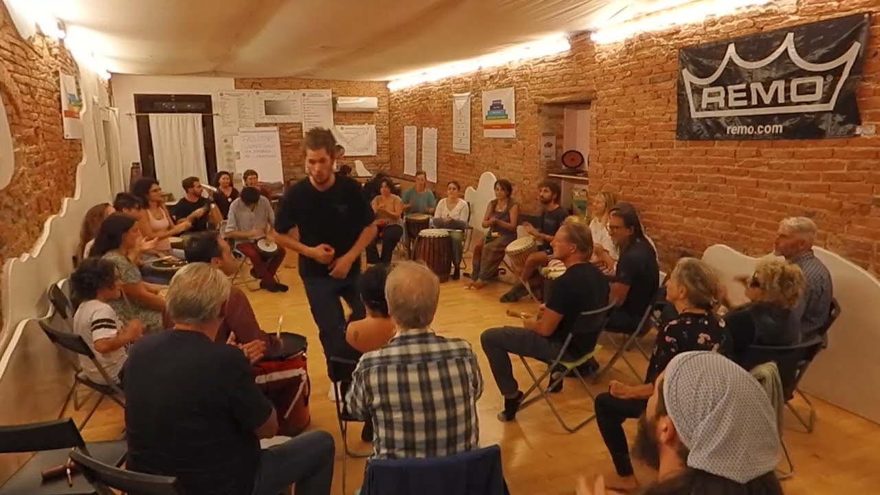 Matteo Mantelli Drum Circle Facilitator in una rhythm-song+clapping+layering in...Great!