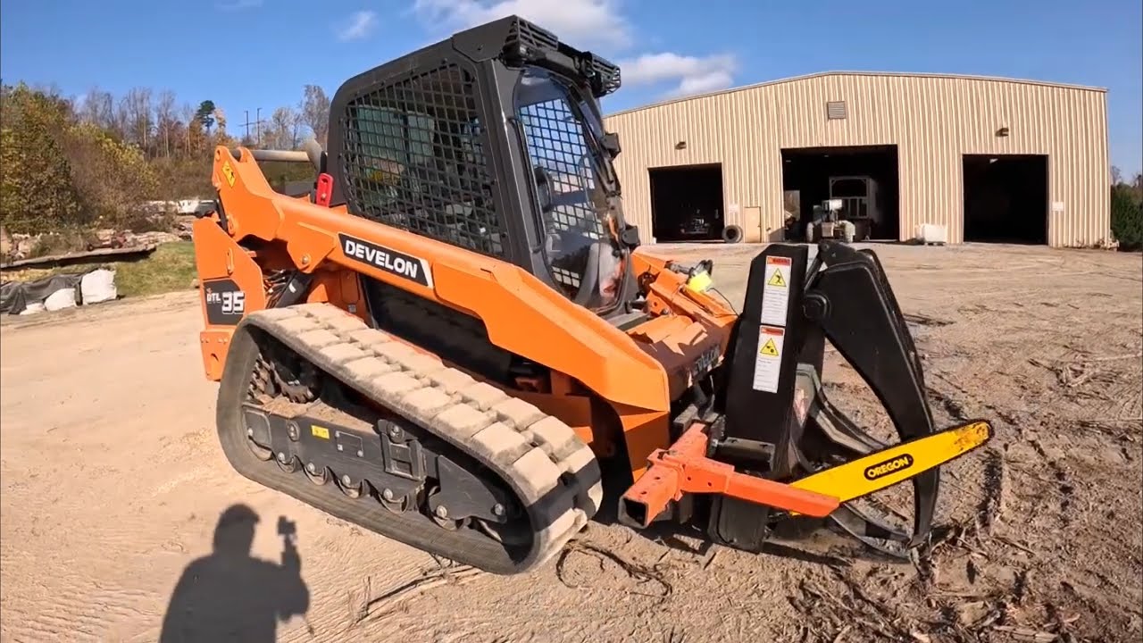 Develon DTL-35 Skid Steer with Halverson HWP 200 GS and SplitForce Self Propelled Log Splitter