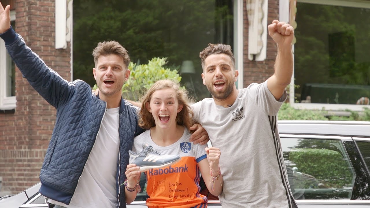 Verga en Kemperman met blije winnares adidas-pakket