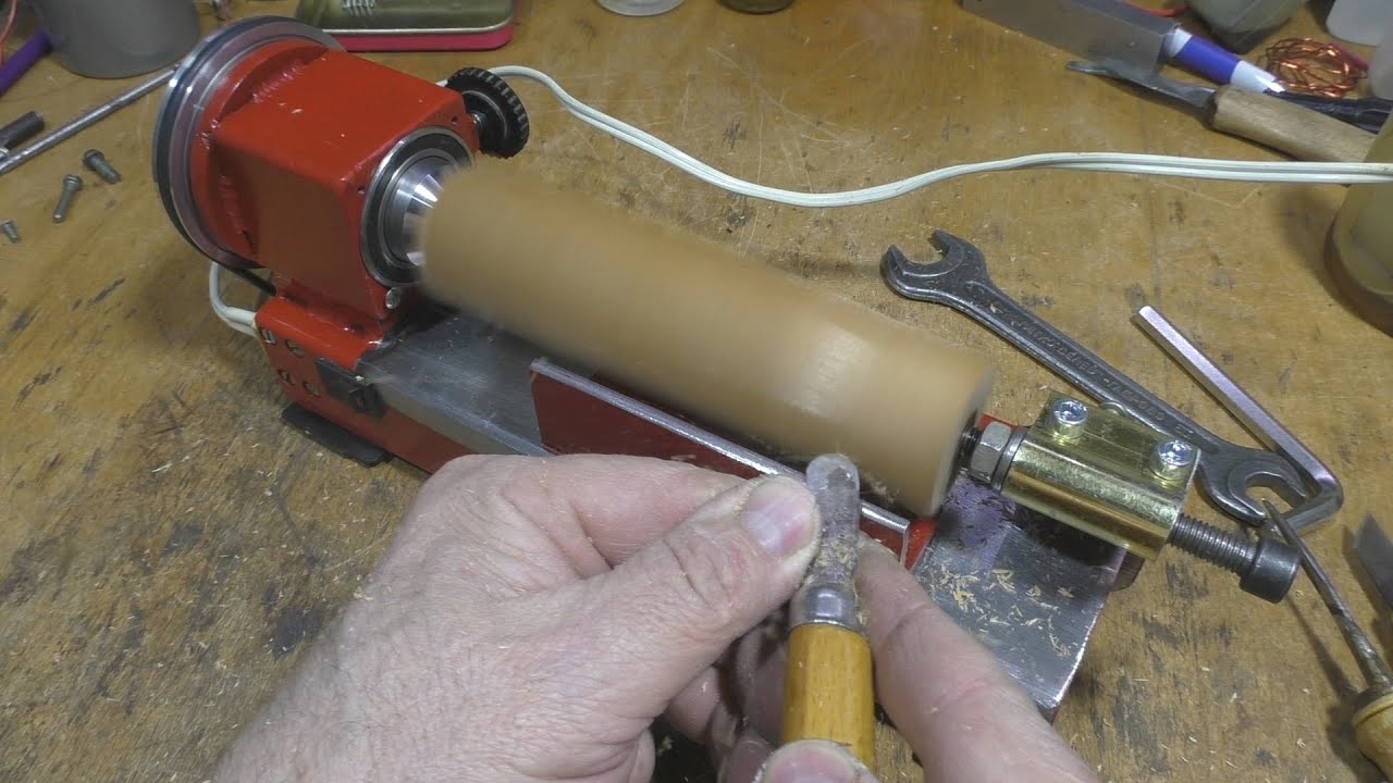 Compact lathe machine made of metal profiles.
