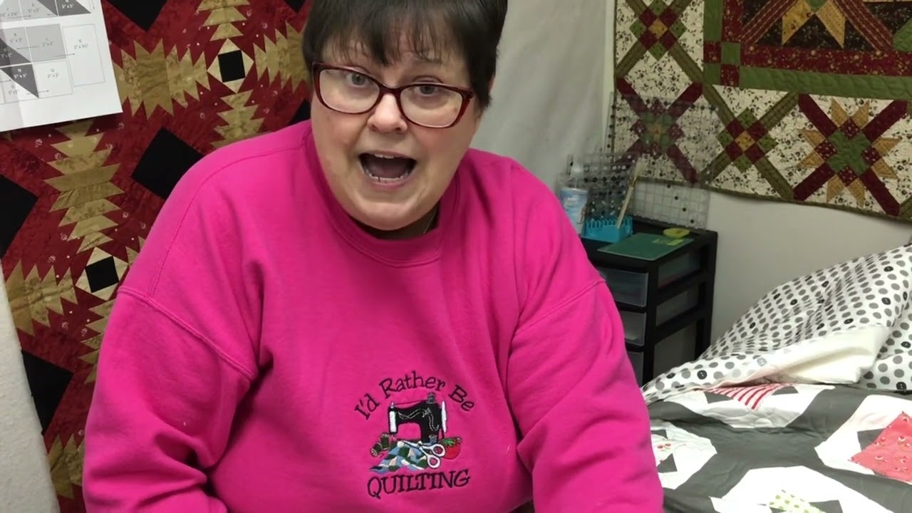 Meet me at the sewing machine.  How to square up a quilt after it’s quilted!