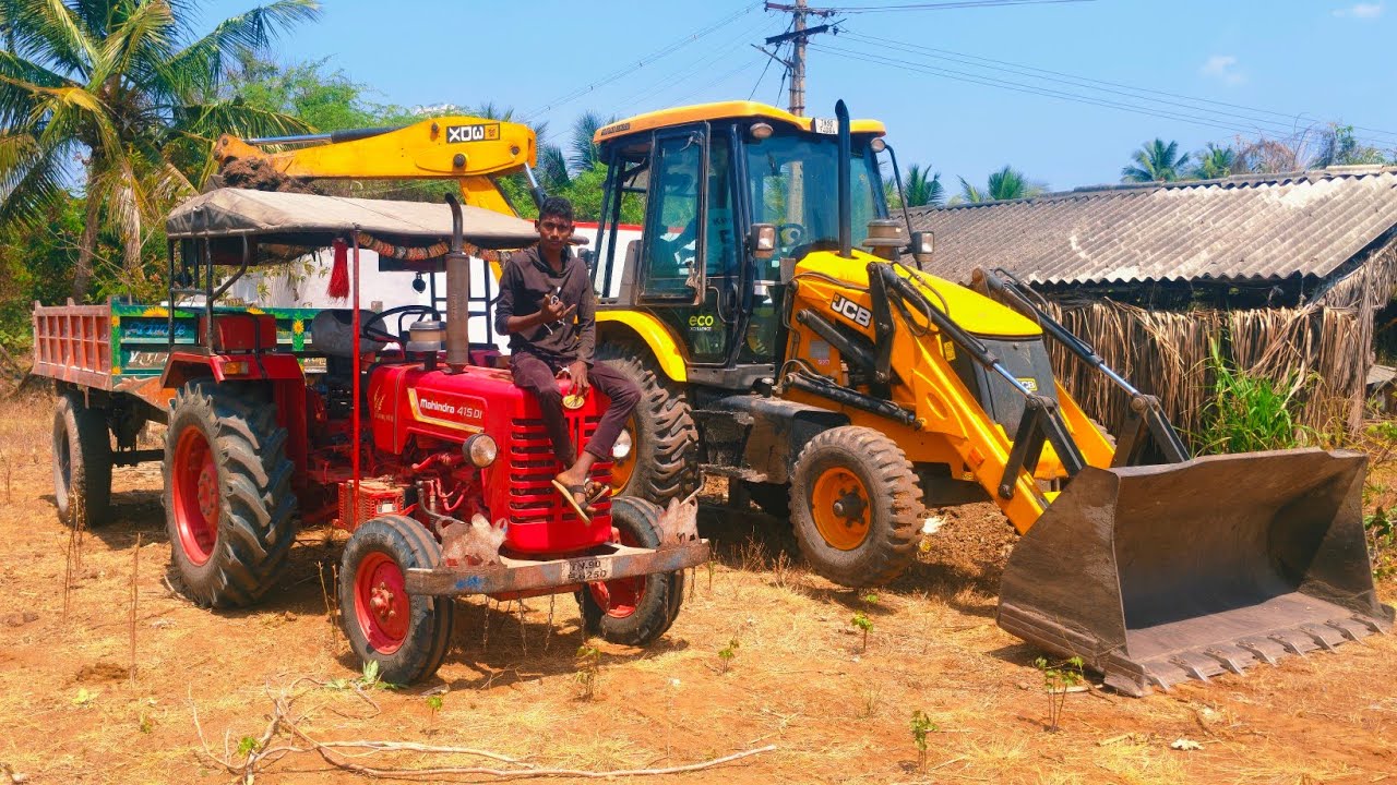 Jcb 3dx backhoe goes to loading cow dung mahindra 415 di tractor 