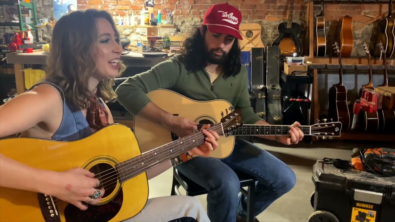 Addie Levy and Eric Platt share a tune at the Gallagher shop.
