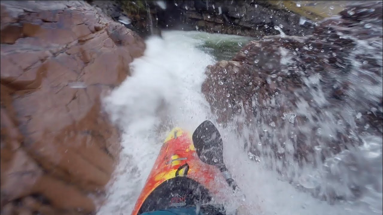 Whitewater kayaking in Glen Etive, Scotland