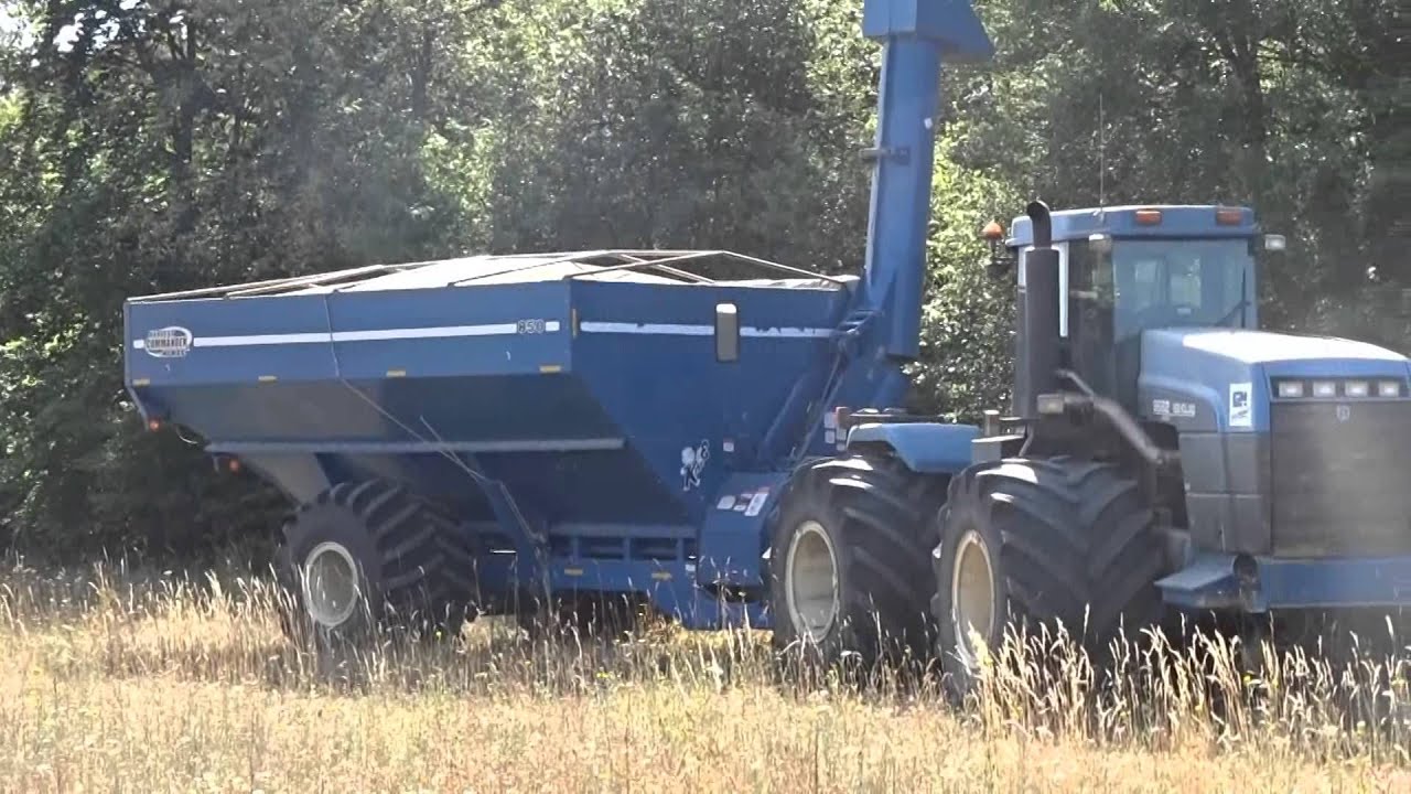 BIG FARM !!! new holland versatile 9682 & transbordeur kinzé & claas lexion 760 montana x2