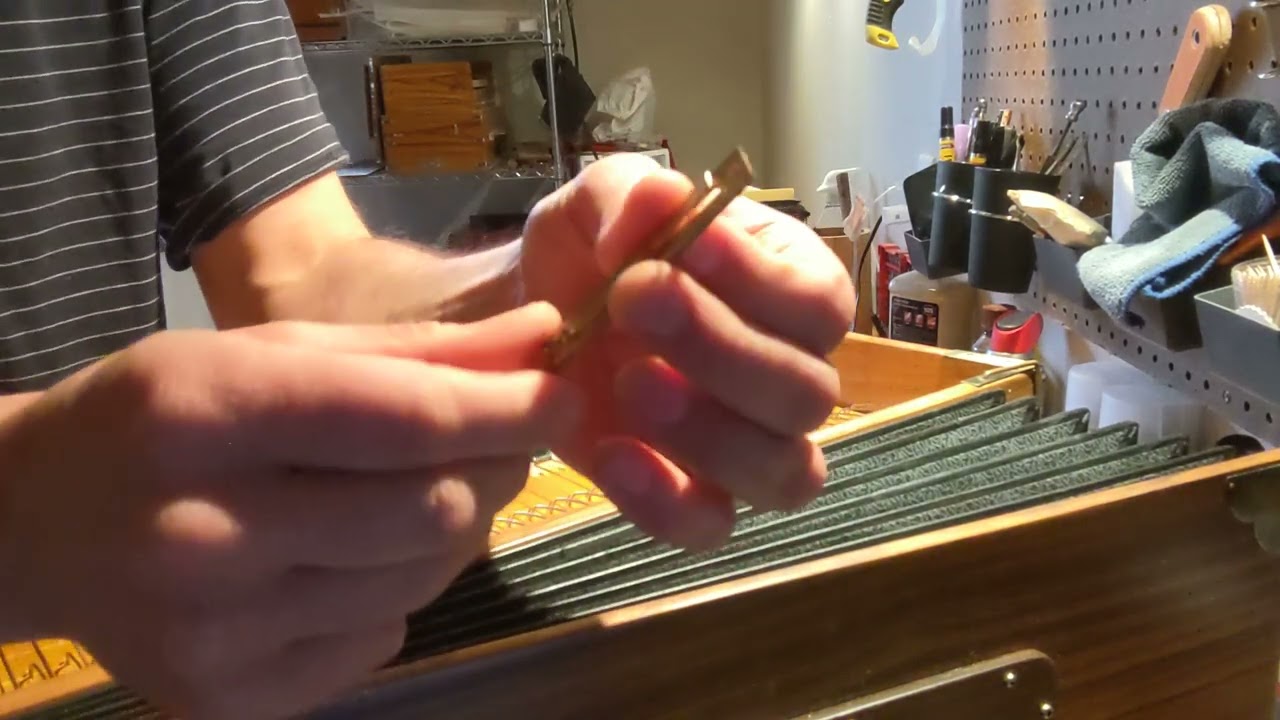 How to fix a buzzing harmonium reed