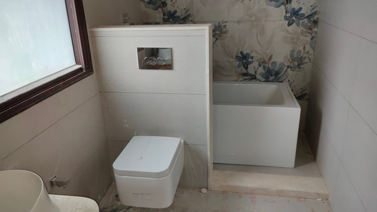 Luxurious Bathroom design with bath tub and hand wash design