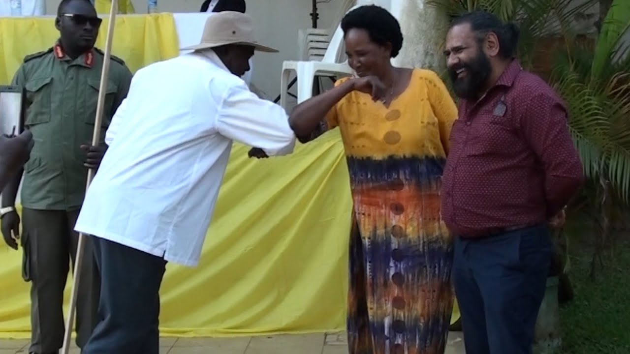 How President Museveni greets -Teacher Mpamire the comedian