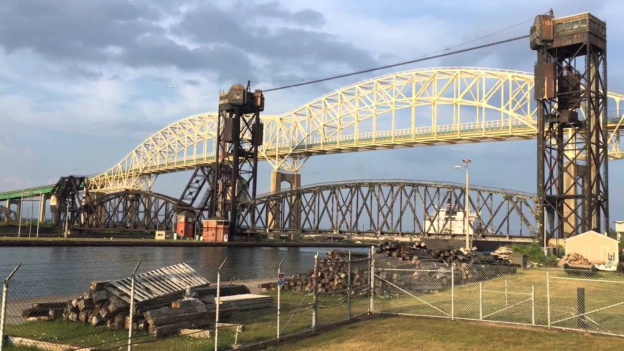 Soo lift bridge closing for train and opening for boat
