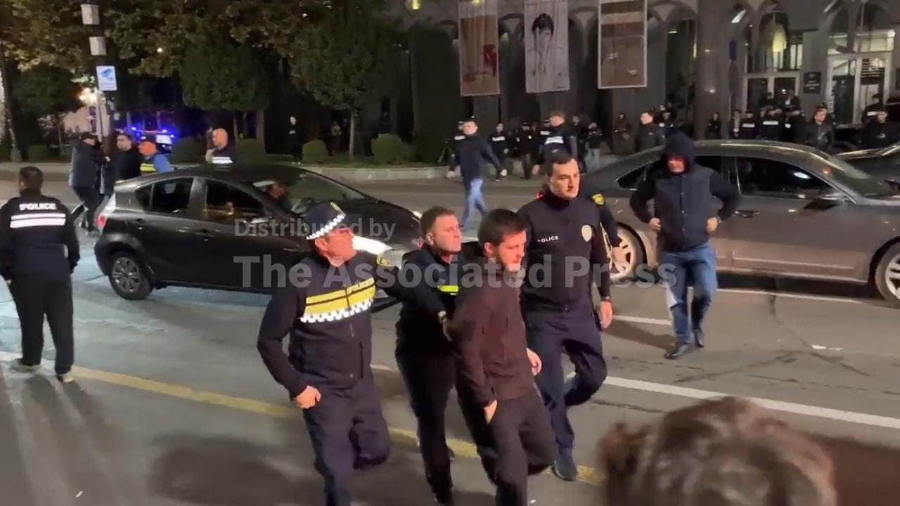 Police detain demonstrators at rally in Georgia capital honoring jailed journalist