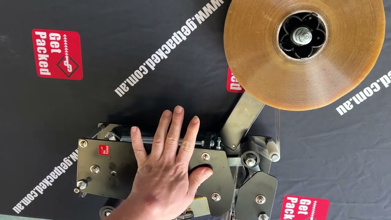 How to Load Machine Tape onto a Carton Sealer - 2-GPCS-C26U