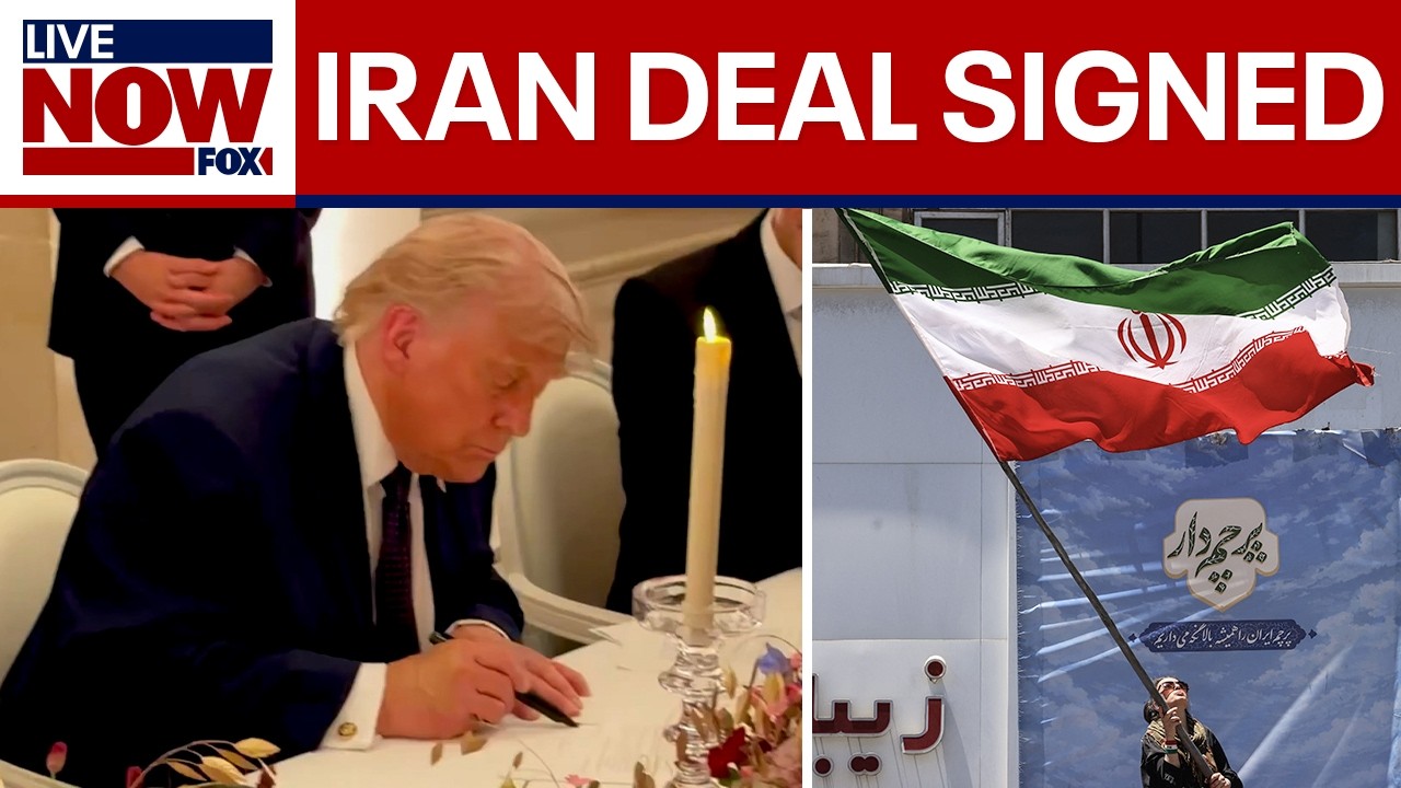 NEW VIDEO: Trump signs US-Iran agreement while in France