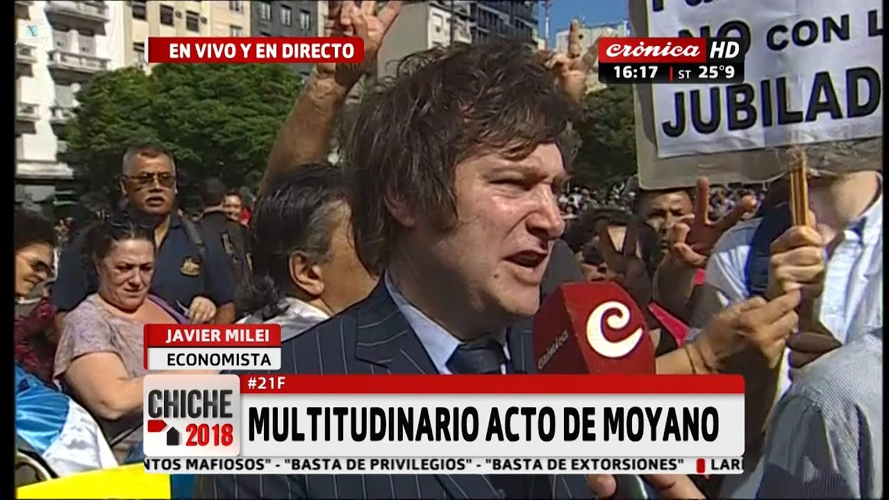 Javier Milei con Santiago Cuneo en la marcha de Moyano, en 