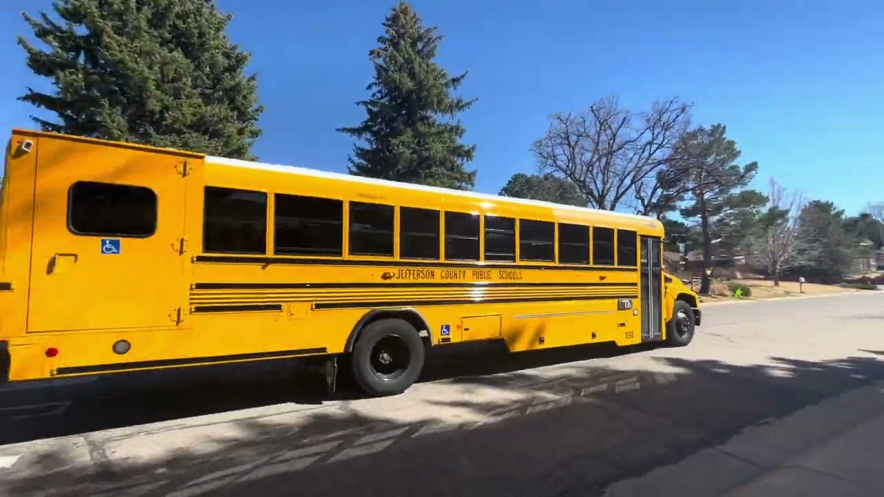 Bus 305 and 198 leaving the school 