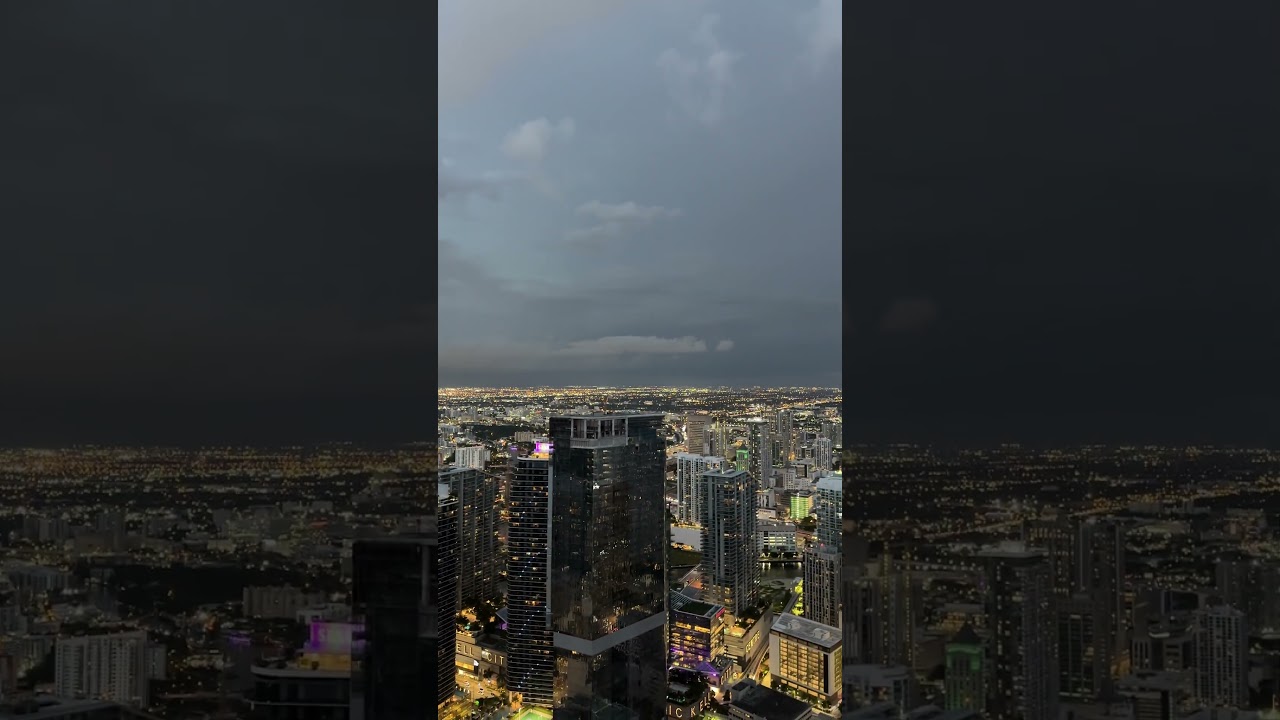 Big lightning storm is approaching the city at night.
