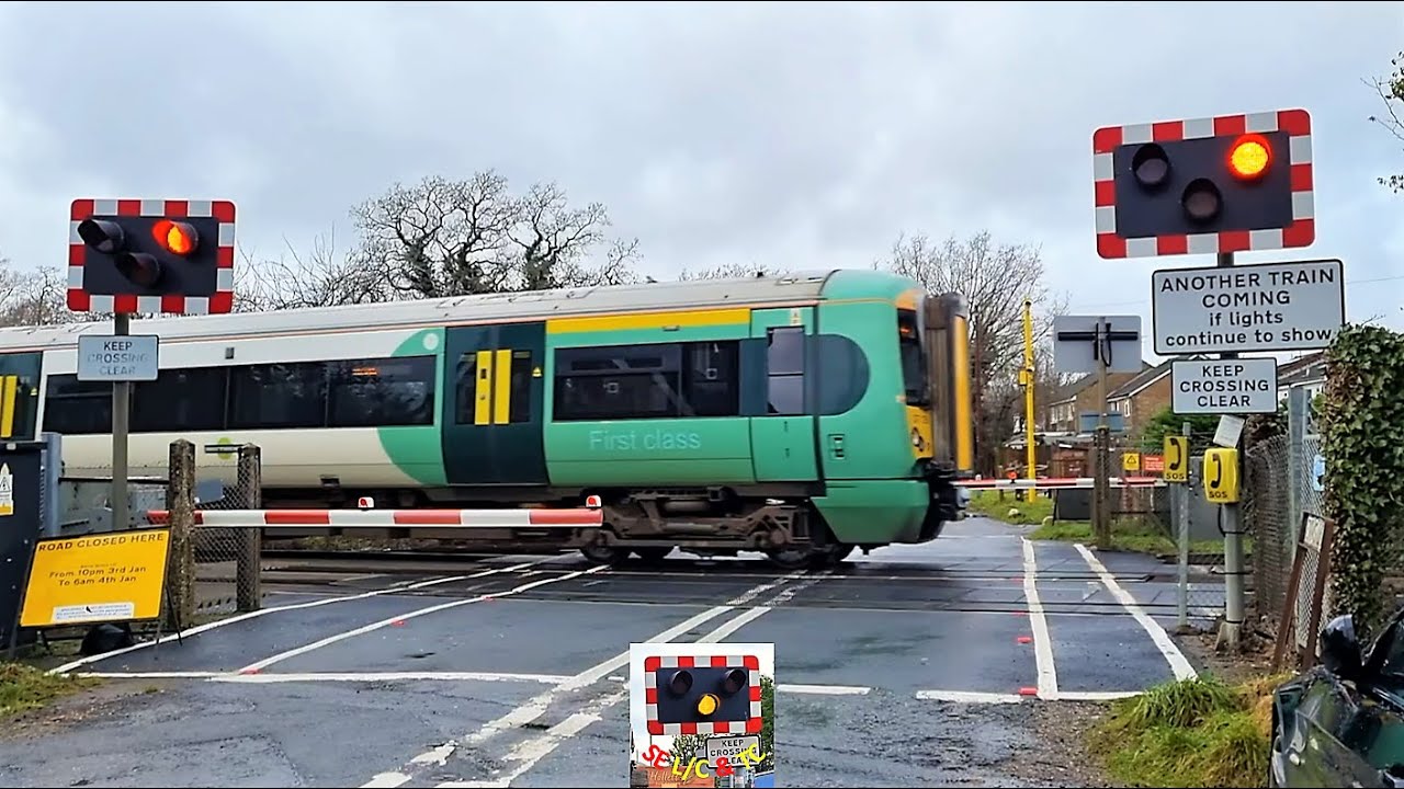 (Two trains in one lowering) Barns Green Level Crossing, West Sussex