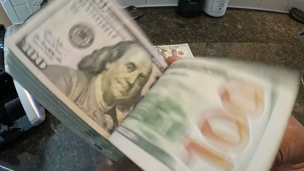 counting $10,000 yon world money