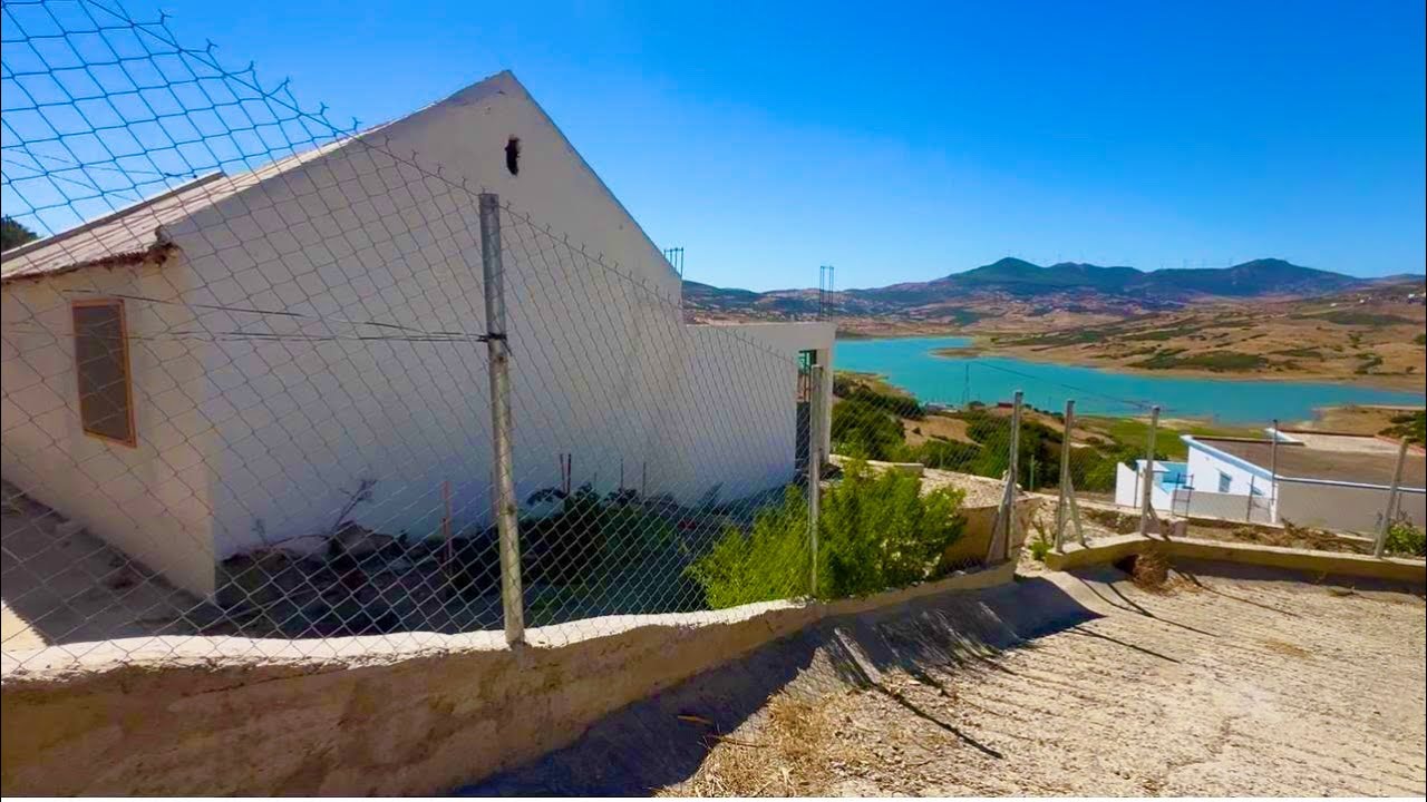 دار بلدية ودار بالكرابة وغرسة مفججة ومطلة على السد 0703640826نواحي الخميس انجرة طنجة