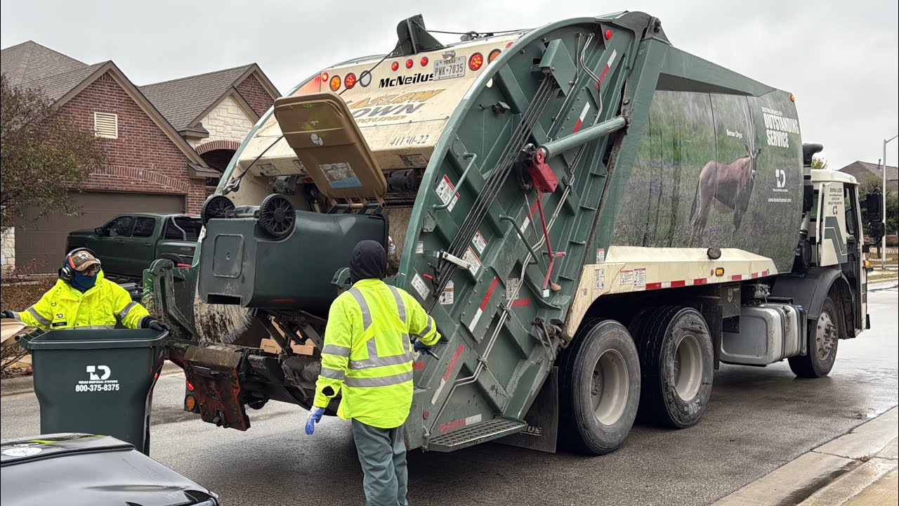Texas Disposal Systems Mack McNeilus Rear Loader Garbage Truck